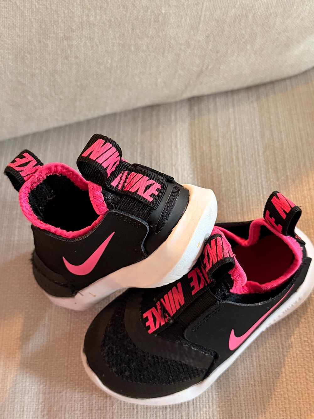 Nike Kids Black and Hot Pink Slip-On Sneakers